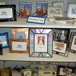 Shelves filled with various sizes of picture frames