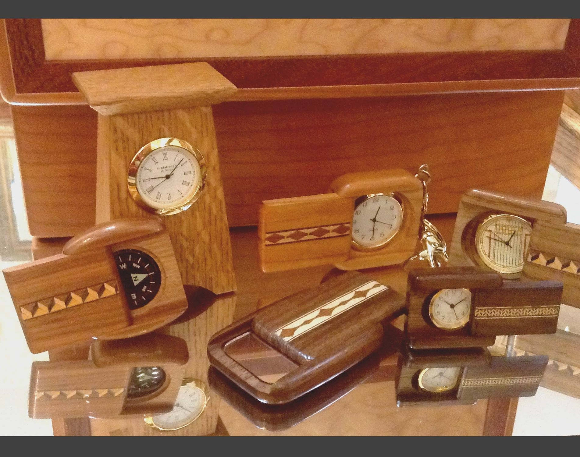 Custom wood turnings to hold various sized clocks from the Frame Cellar in Springhouse