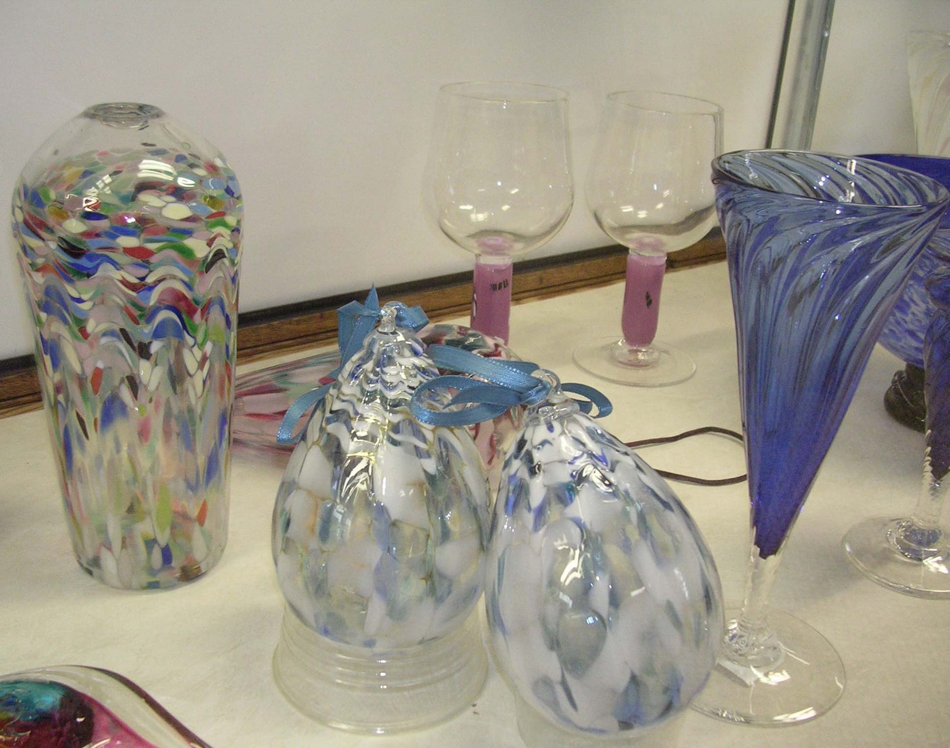 Hand-blown glass sculptures, vases, and glasses from the Frame Cellar